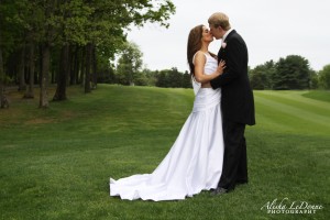 Bride-and-Groom-on-9th-Fairway-Kissing